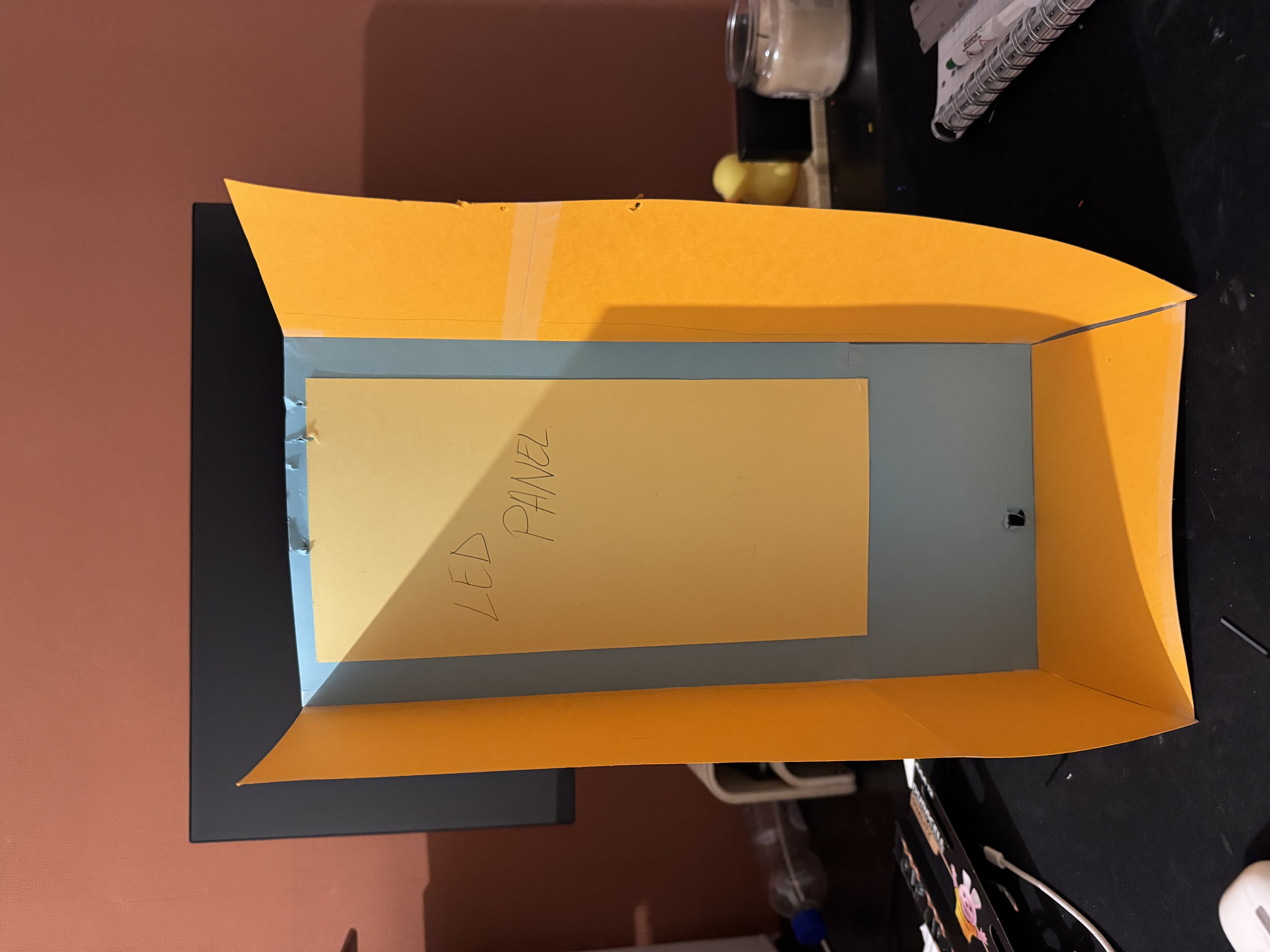 Paper mockup used to test proportions and scale